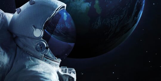 Astronaut floating in front of Earth