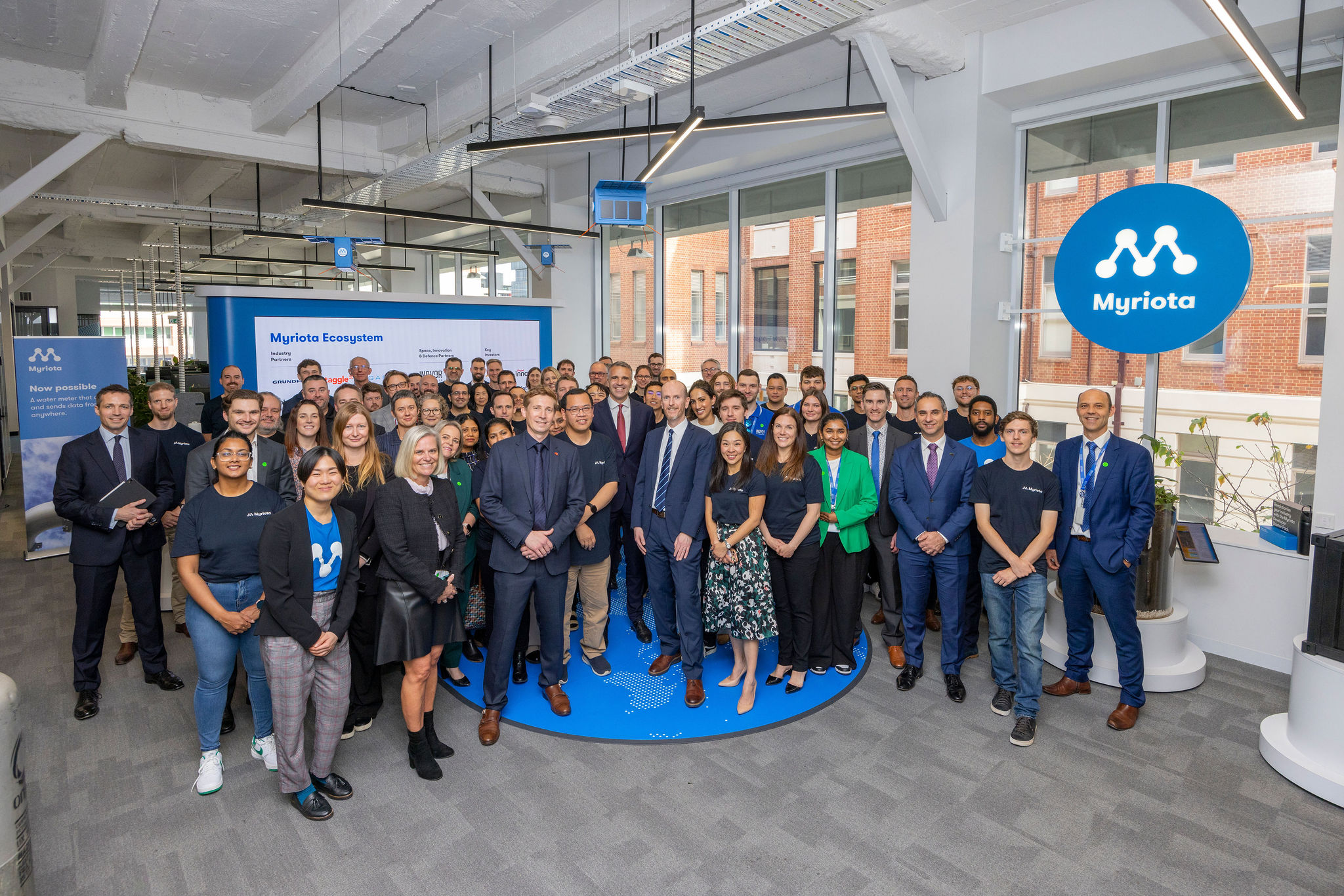 A large group from Myriota unveiling their new Habitat centre